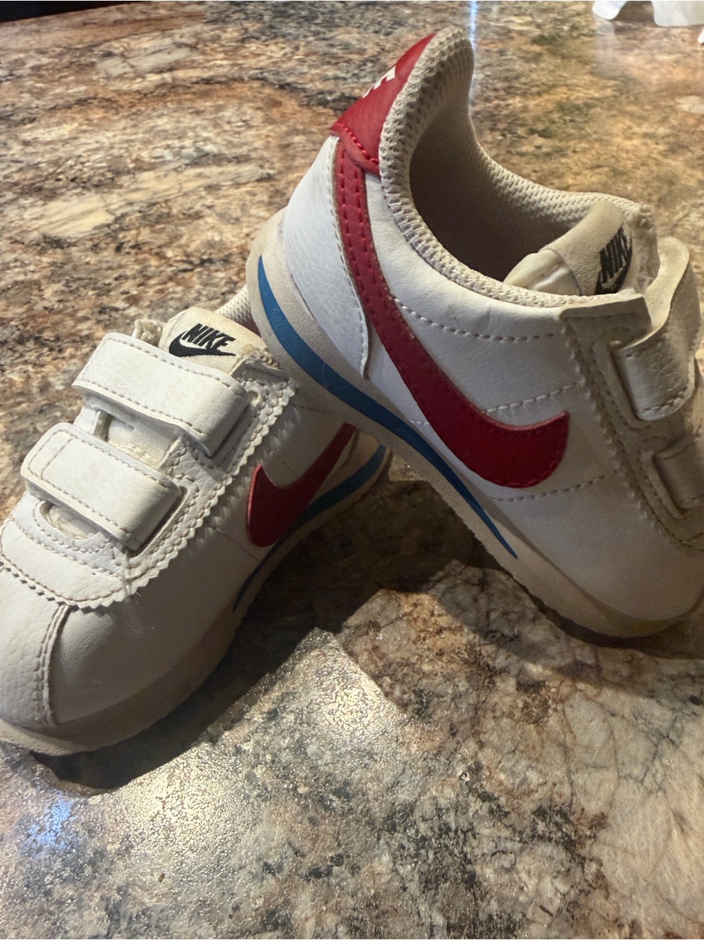 Nike Kids White Sneakers With Red Swoosh And Blue Trim